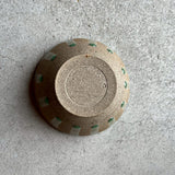 Small bowl of mandarin orange ash [84]